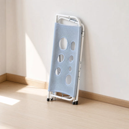 Flip Gear Hammock folded flat for storage against a wall