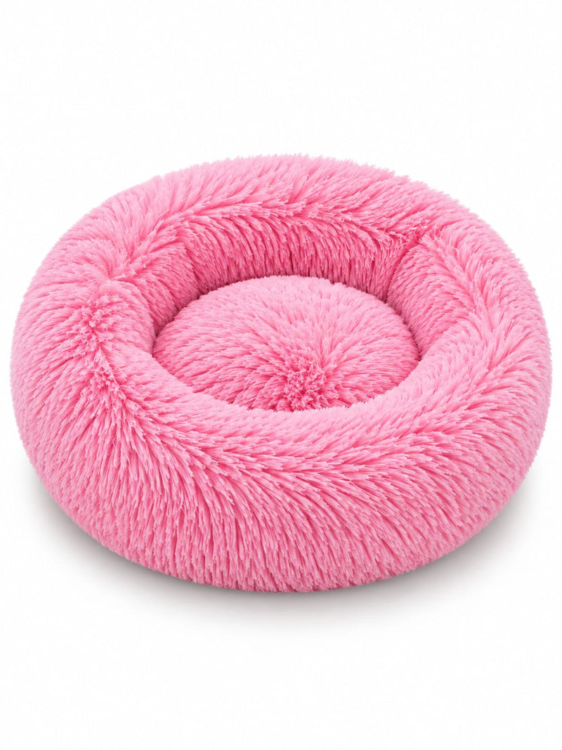 SnoozeCloud calming pet bed in Bright Pink — round donut bed with ultra-soft long plush and raised rim