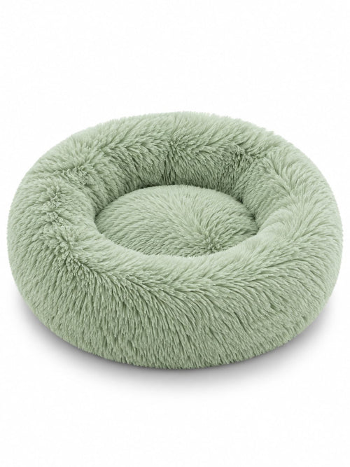 SnoozeCloud calming pet bed in Sage Green — round donut bed with ultra-soft long plush and raised rim